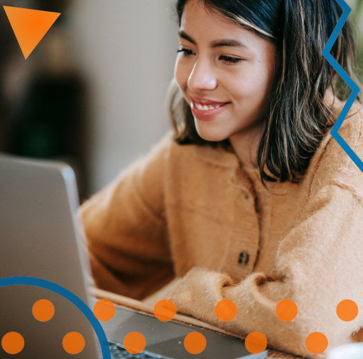 woman smiles at laptop