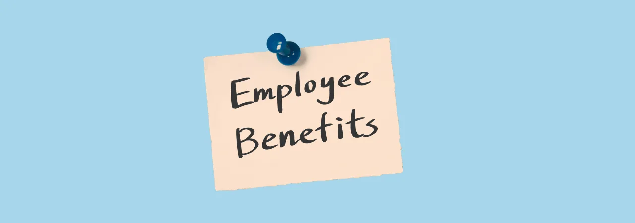 a blue background with a sticky note and a pin in the middle which says employee benefits