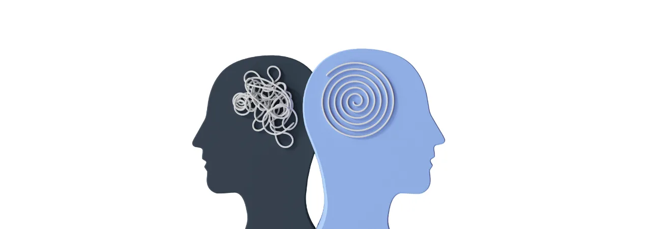 an image of two head figures in solid blue colours facing away with spirals on their head to represent mental health
